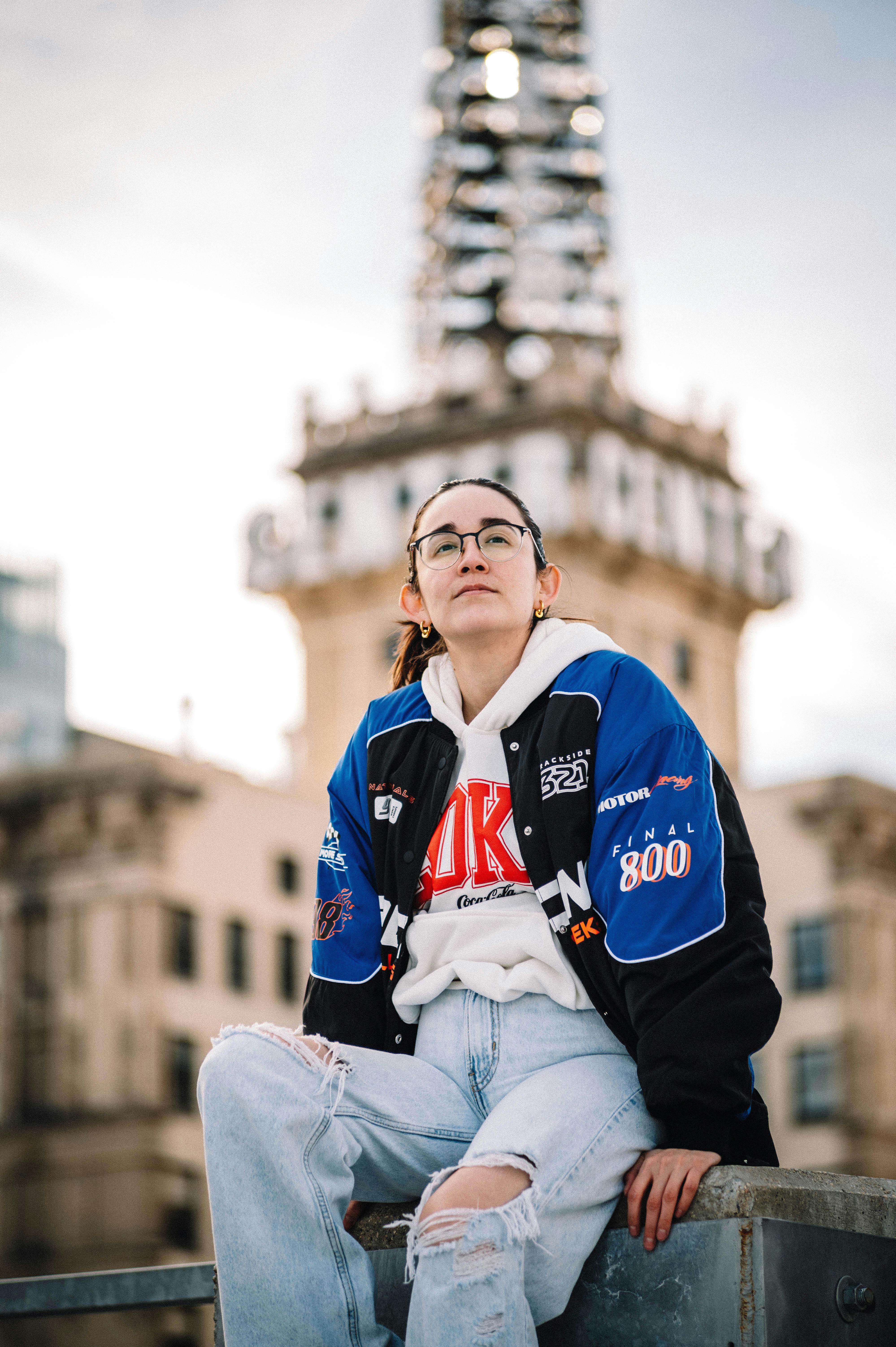 fashionable young woman on a terrace of a skyscraper