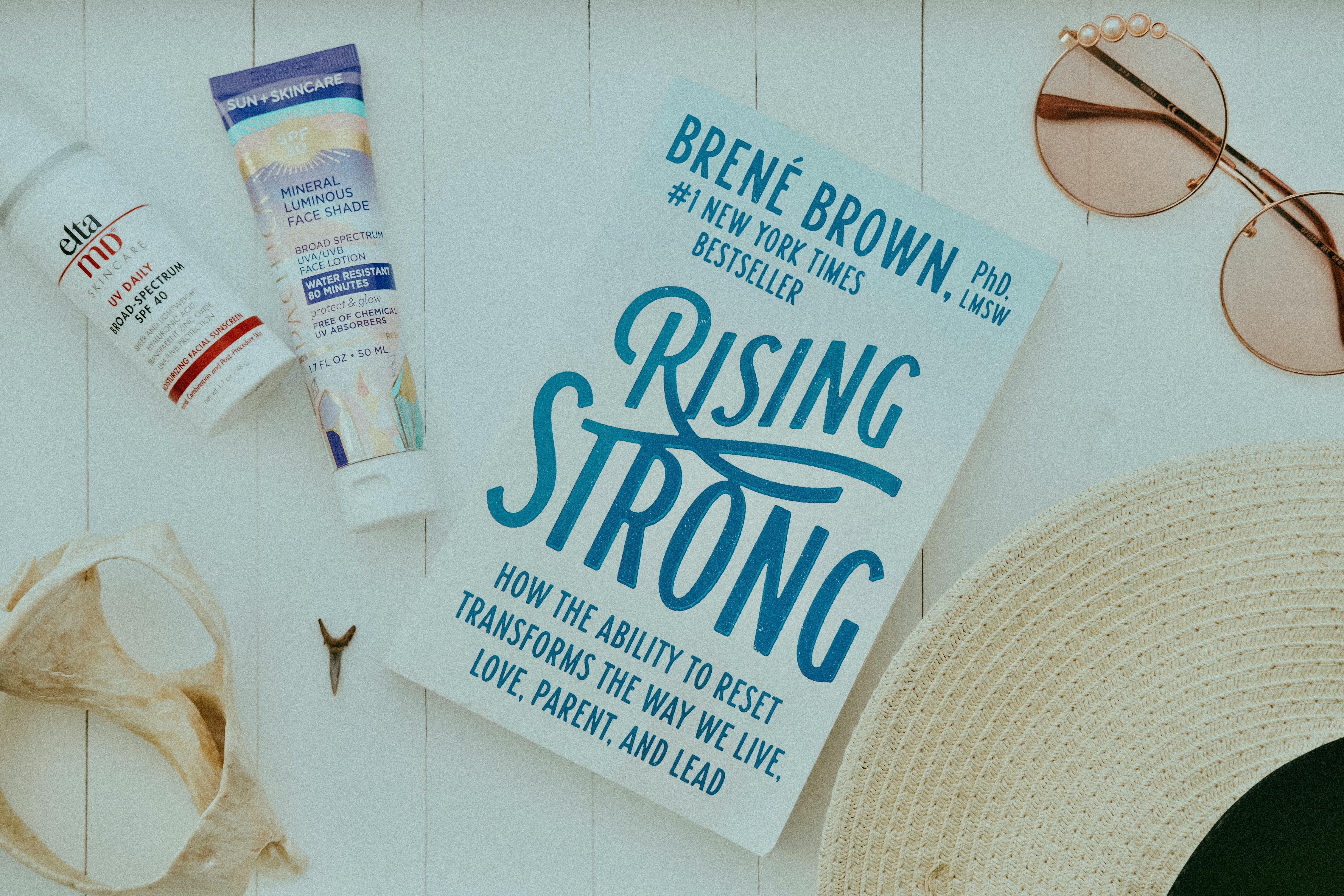 Sun Cream and Straw Hat · Free Stock Photo