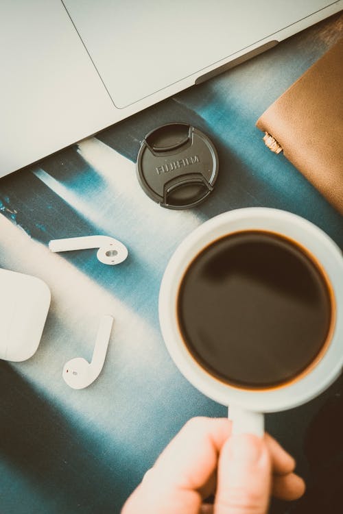 Coffee Cup and Airpods