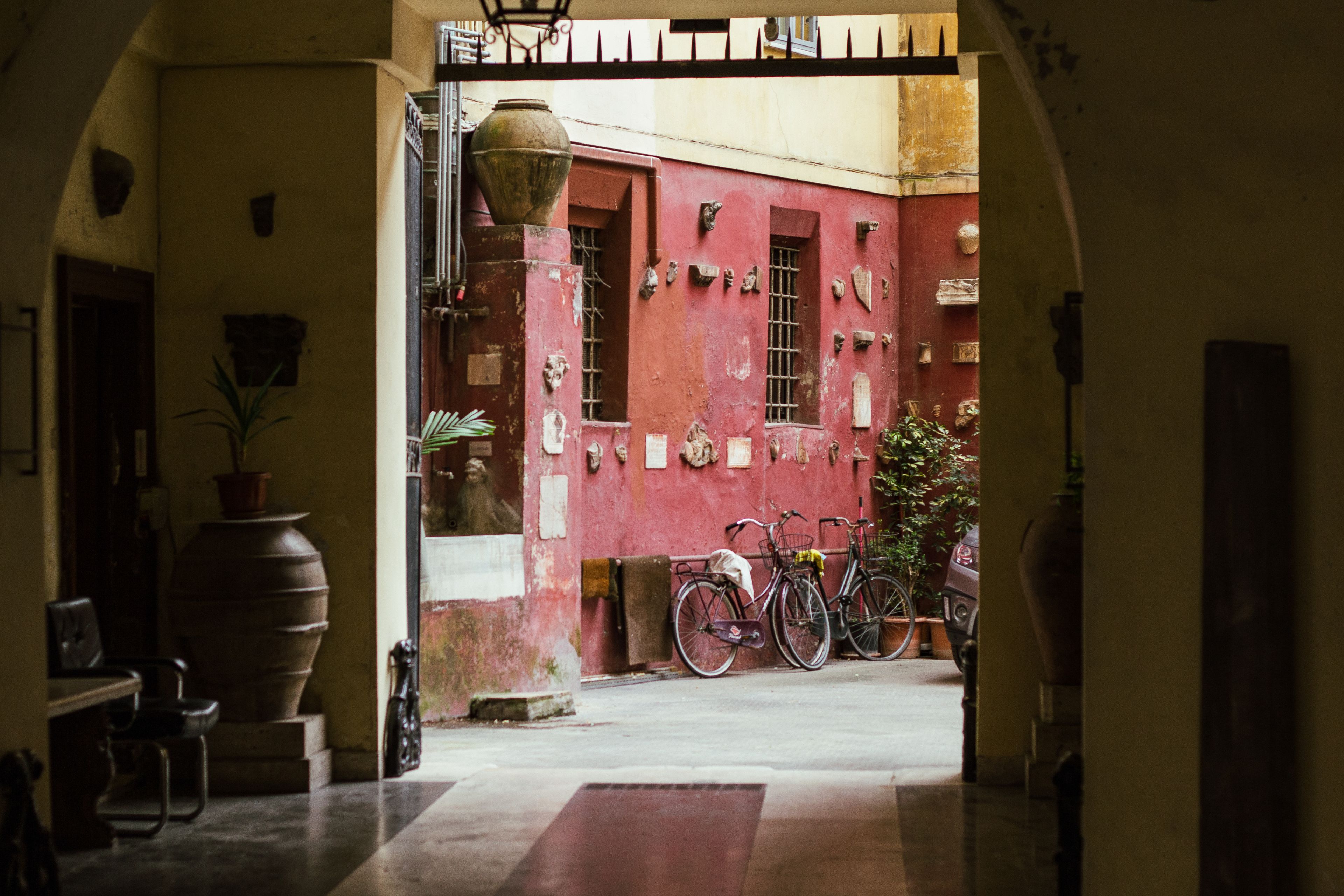 Quiet orange-tree courtyard at Hotel Santa Maria in Trastevere, Rome