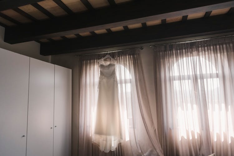 A Wedding Dress In A Room