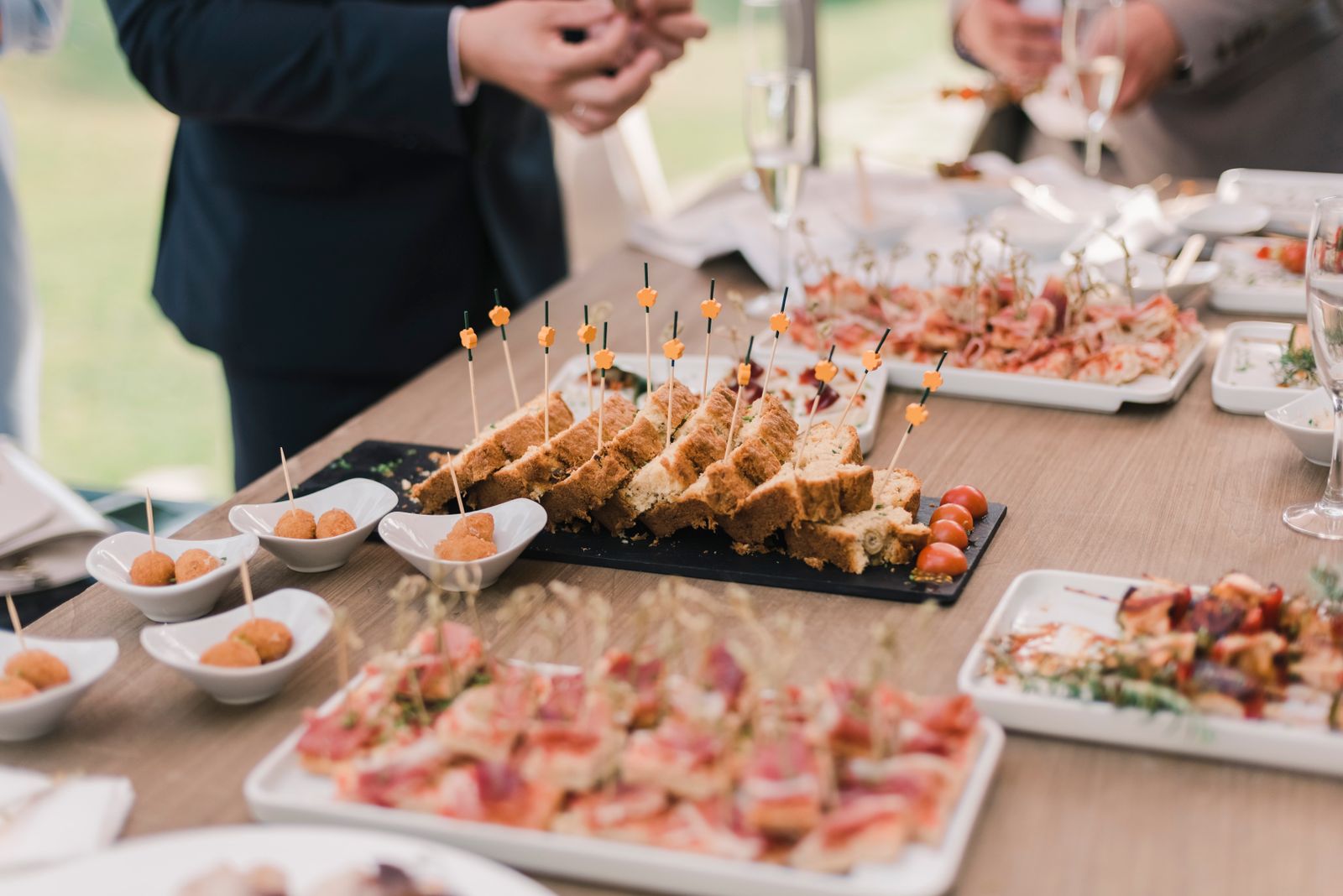 Catered dishes presented on a banquet table
