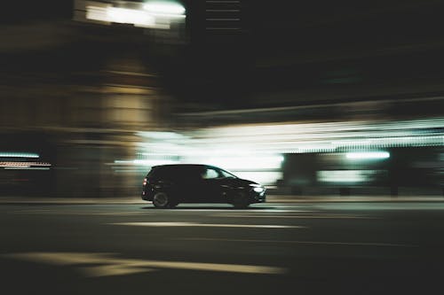Black Car on the Road during Nighttime