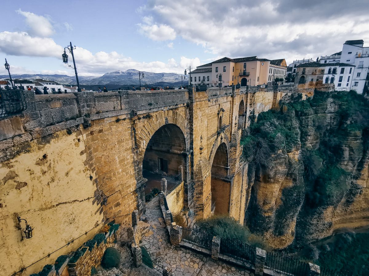 Ronda's Puente Nuevo spans the 120-meter El Tajo gorge, joining the Moorish old town to the newer quarter.