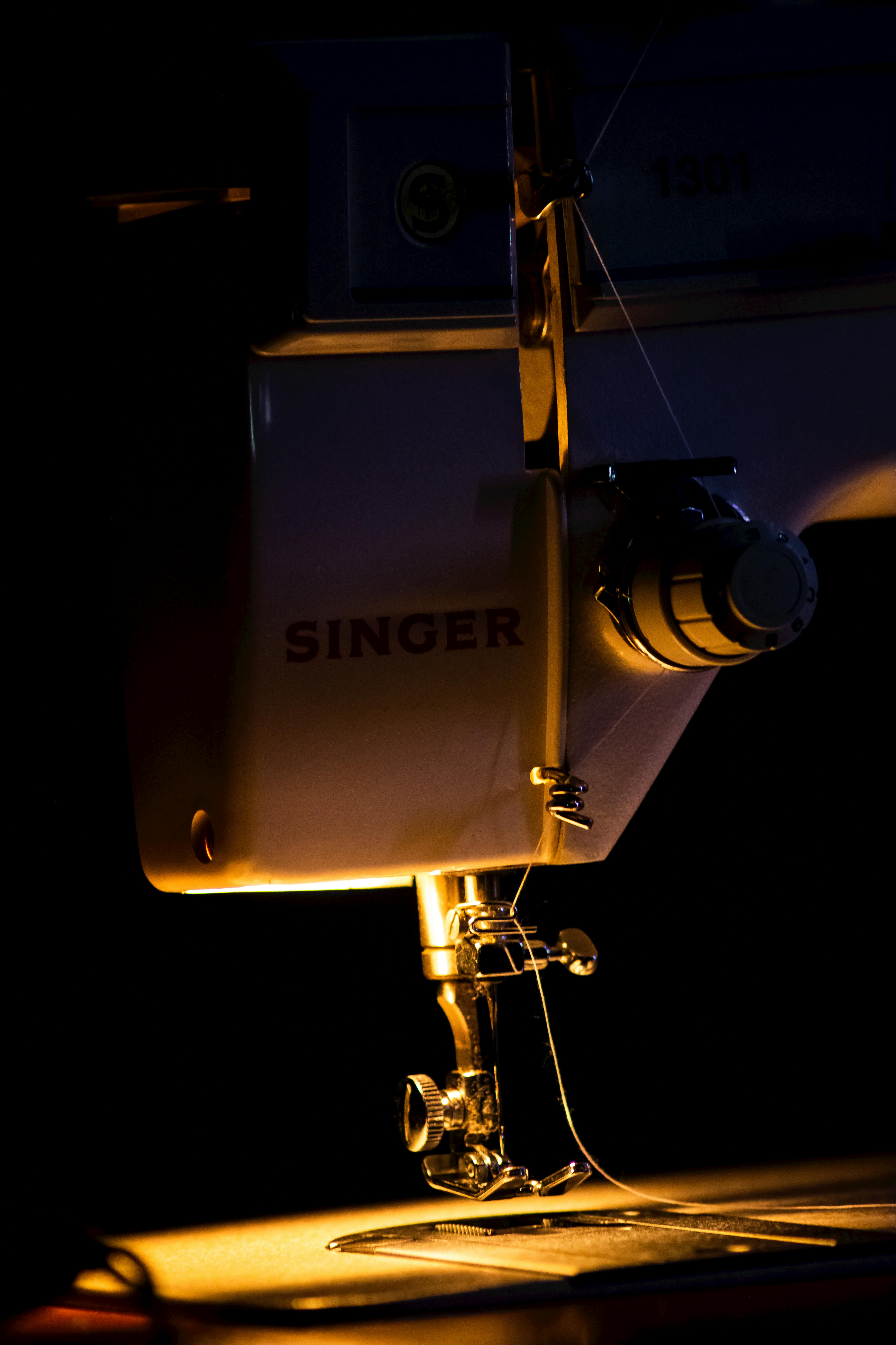 Sewing Machine in Darkness · Free Stock Photo