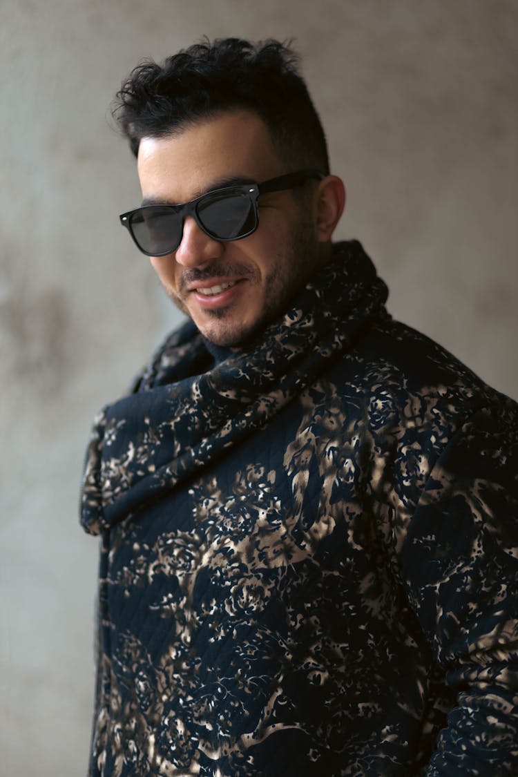 Portrait Of Smiling Man In Sunglasses