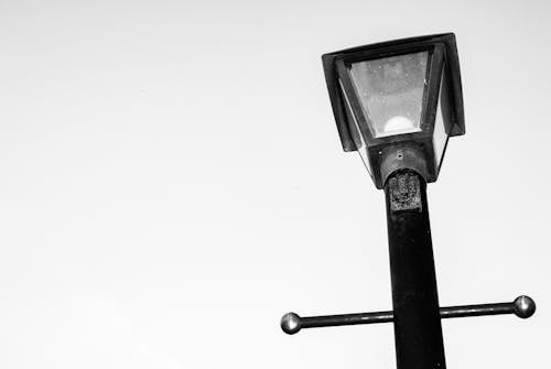 Grayscale Photo of a Street Light 