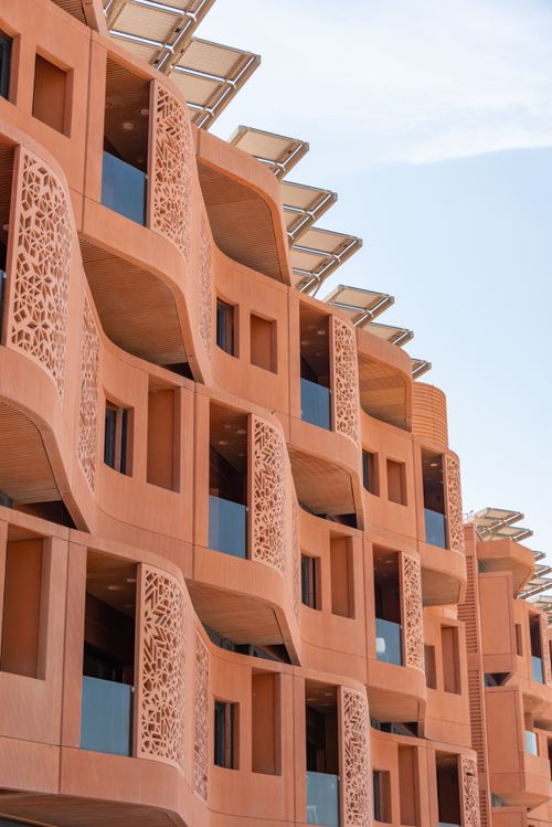 Free Innovative architecture with decorative panels in Masdar City, Abu Dhabi. Stock Photo