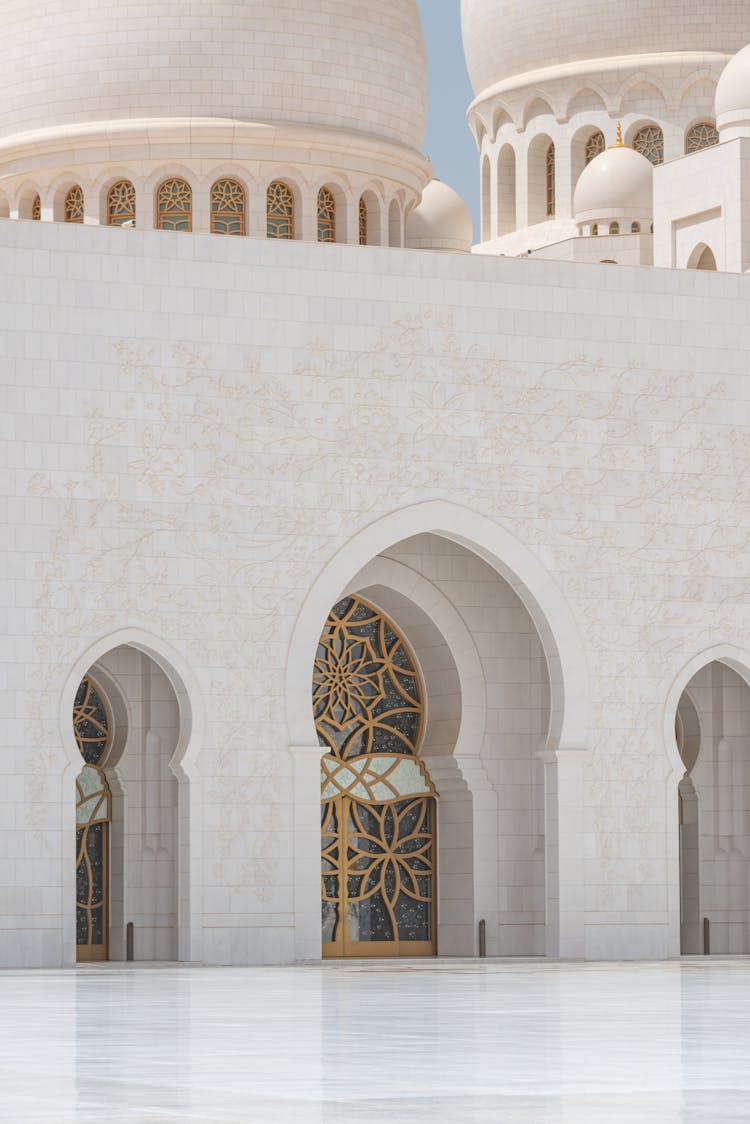 White Traditional Palace Building On Square