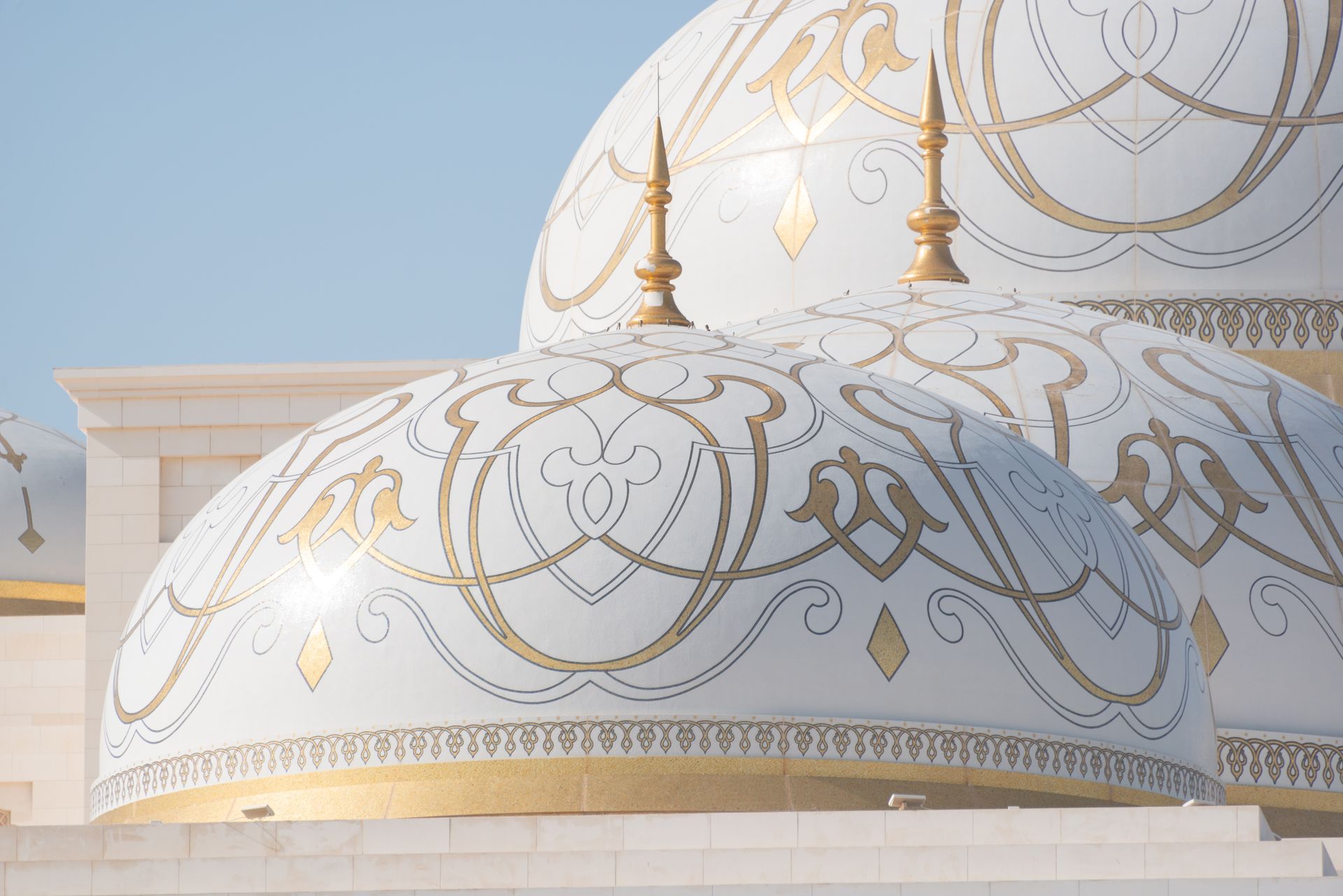 Intricate architectural details of Qasr Al Watan domes in Abu Dhabi, UAE.