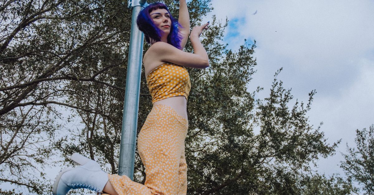 Posing Platform Model Posing in Platform Shoes · Free Stock Photo