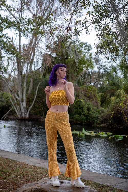 Photo of Woman wearing Yellow Tube Top