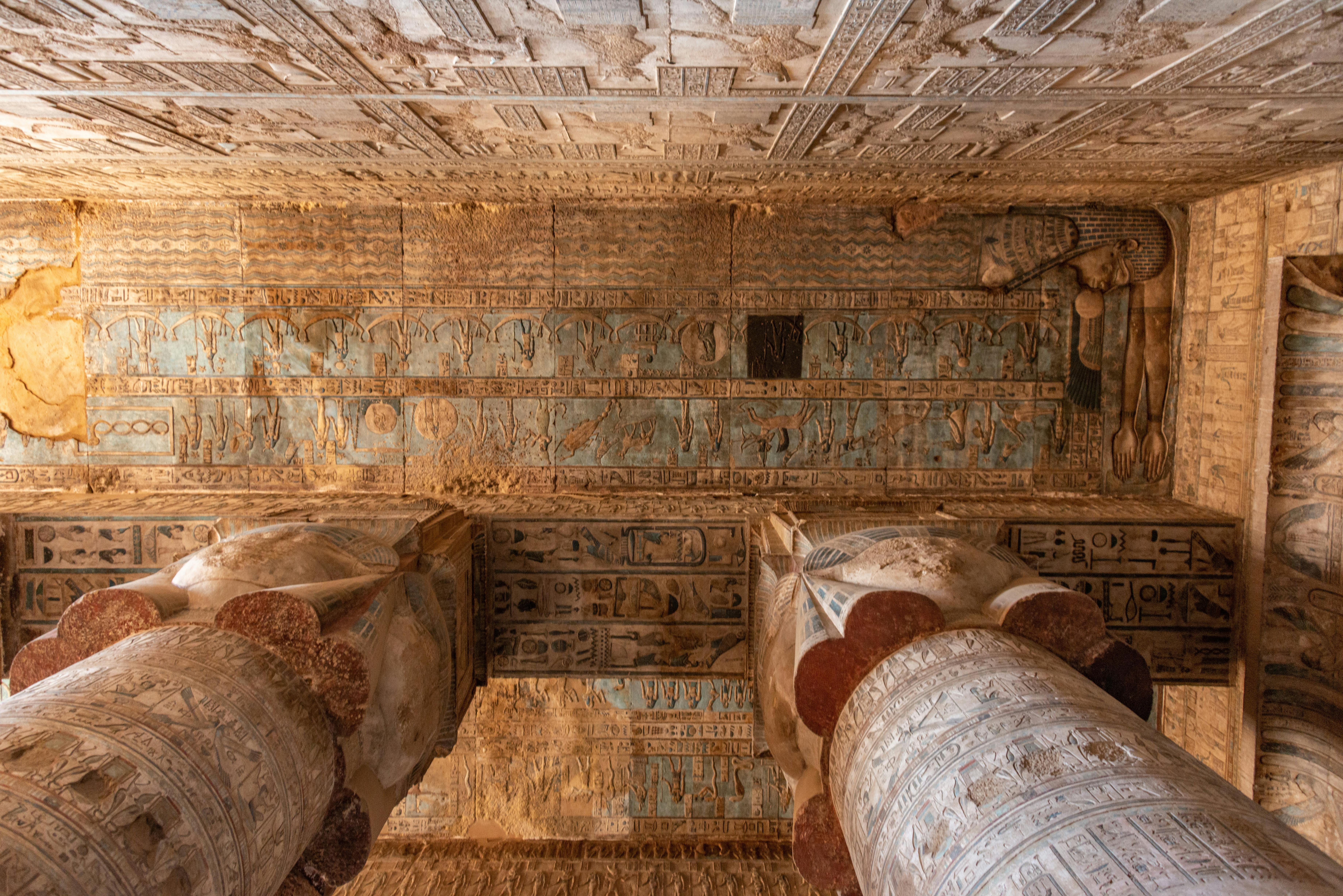 Explore the detailed hieroglyphs and grand columns of Dendera Temple, showcasing ancient Egyptian artistry.