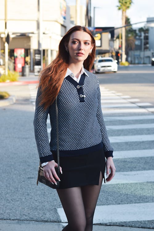 Redhead in Sweater and Mini · Free Stock Photo