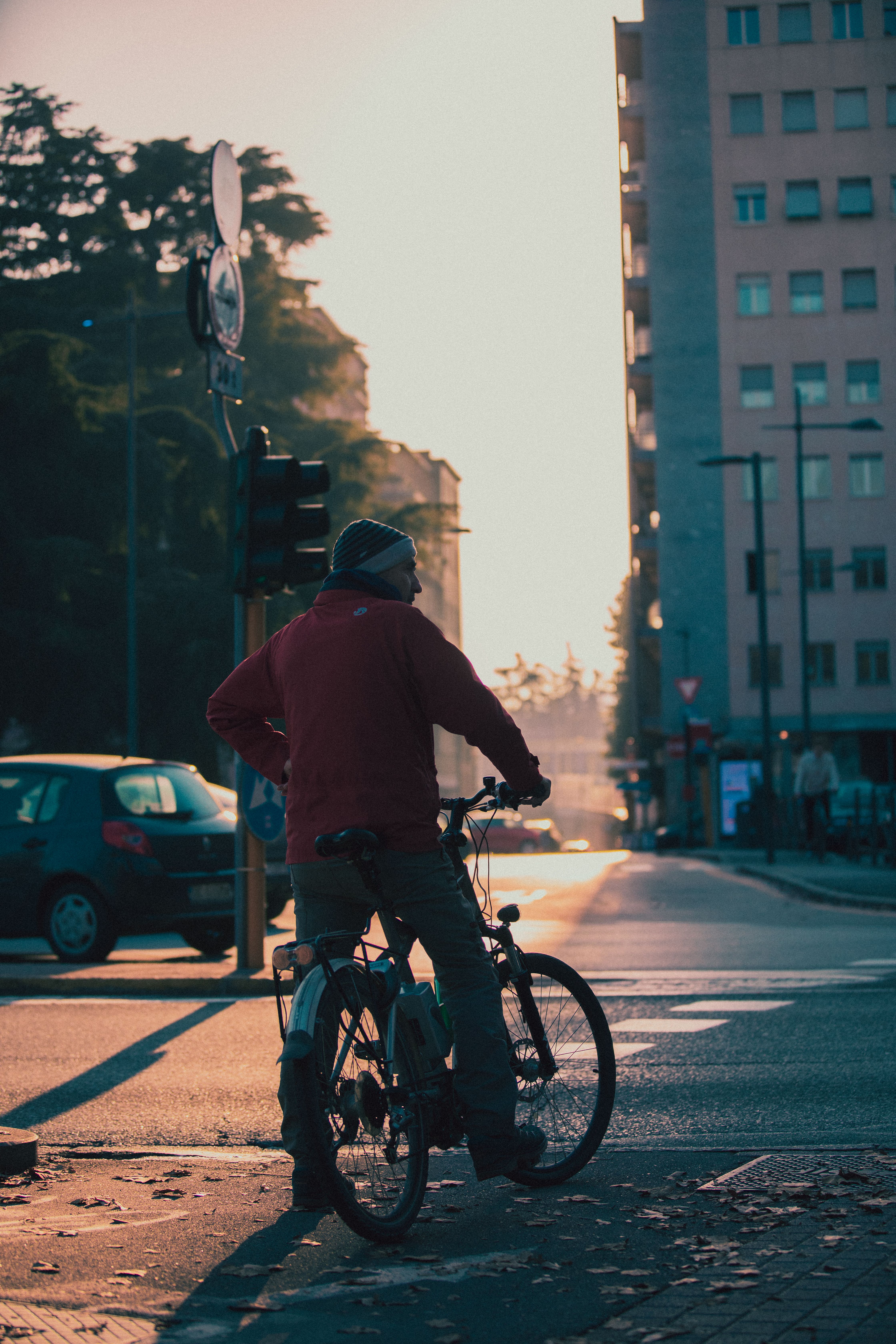 Man in Red Jacket Riding a Bicycle · Free Stock Photo