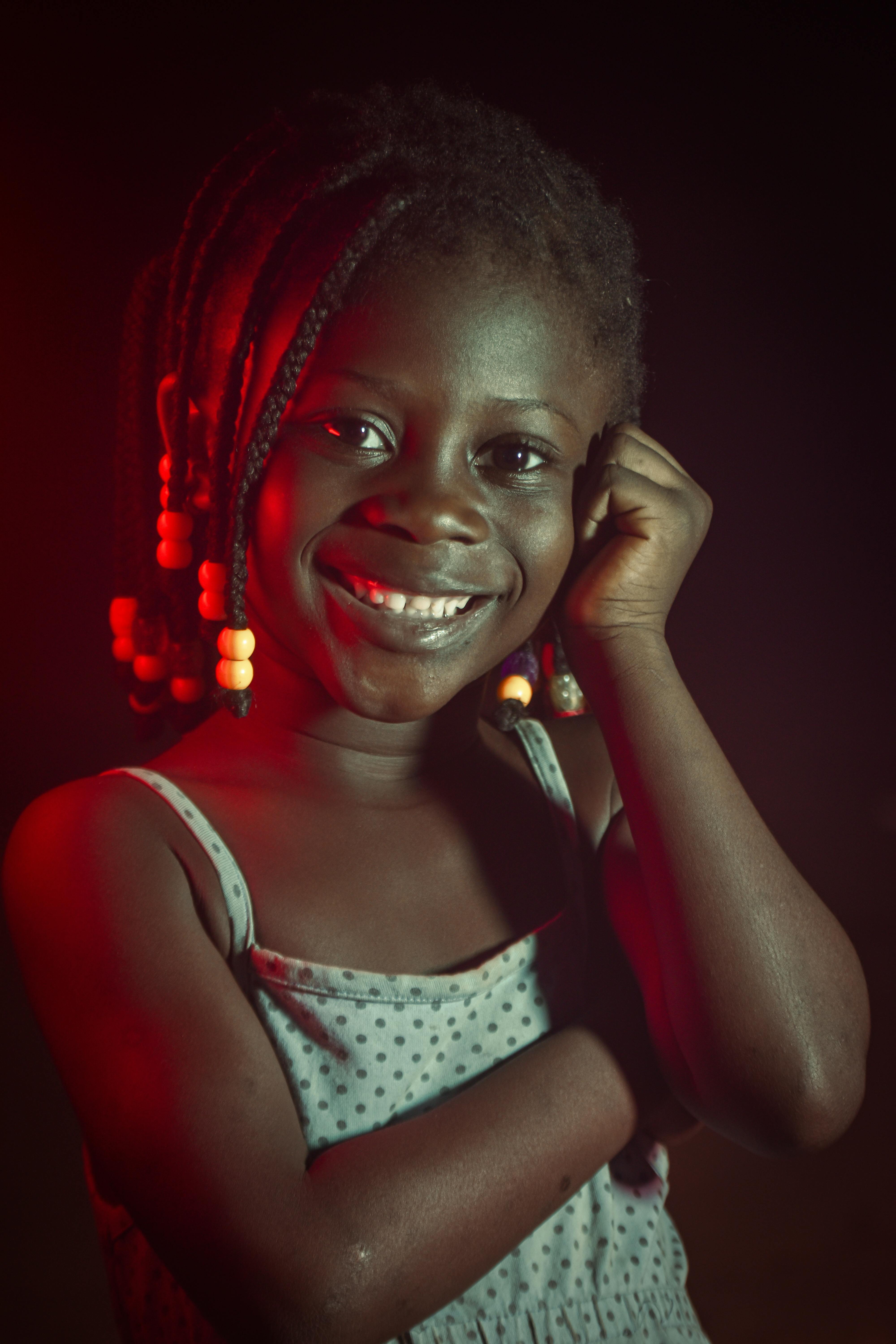 a portrait of a girl with braided hair