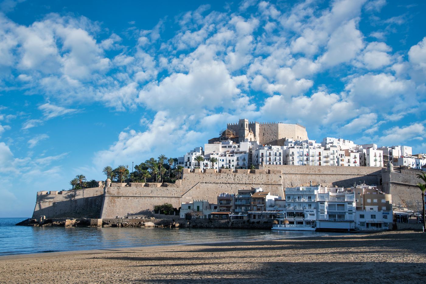 Peñíscola castle with beach and umbrellas on the Costa del Azahar