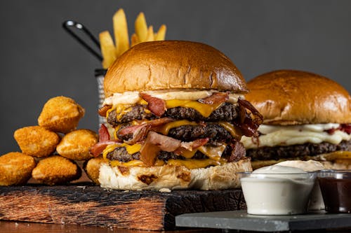 Triple Beef Burger on Wooden Board