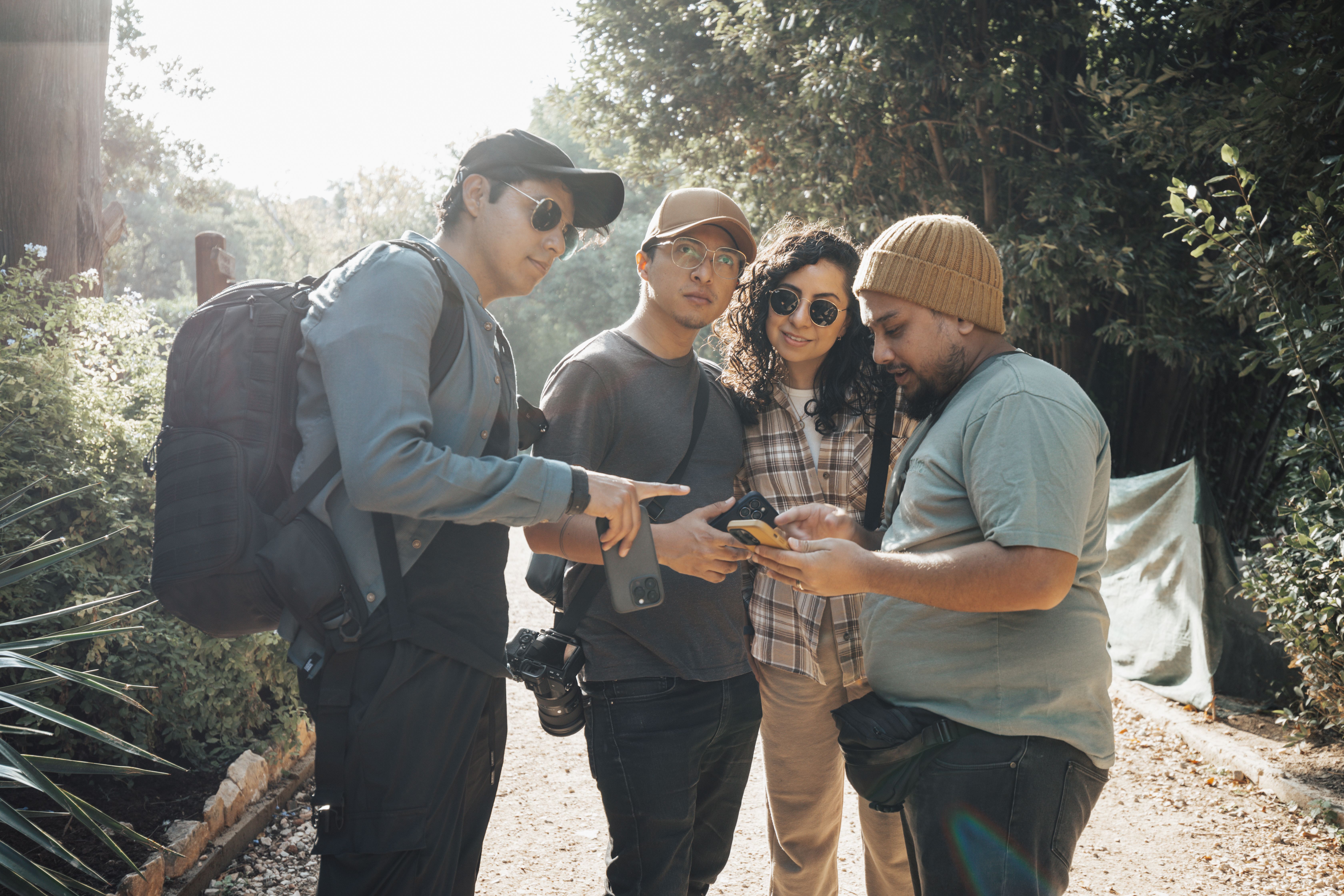 Group of Friends With Smartphones · Free Stock Photo