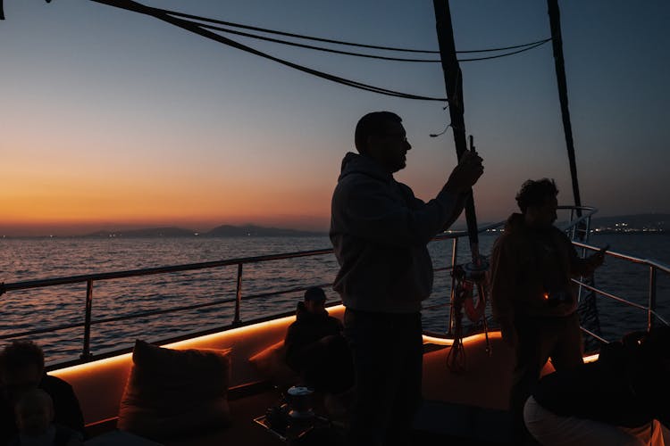 Sailor On Ship At Dawn