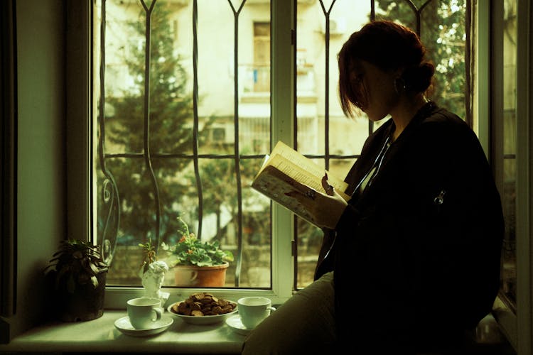 Woman Reading A Book