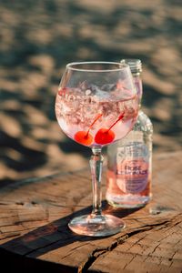 Sparkling cherry lemonade in a chilled glass, photo by Xhemi Photo on Pexels