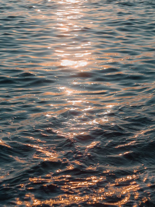 Reflection of Sunlight on the Ripples in the Sea Water