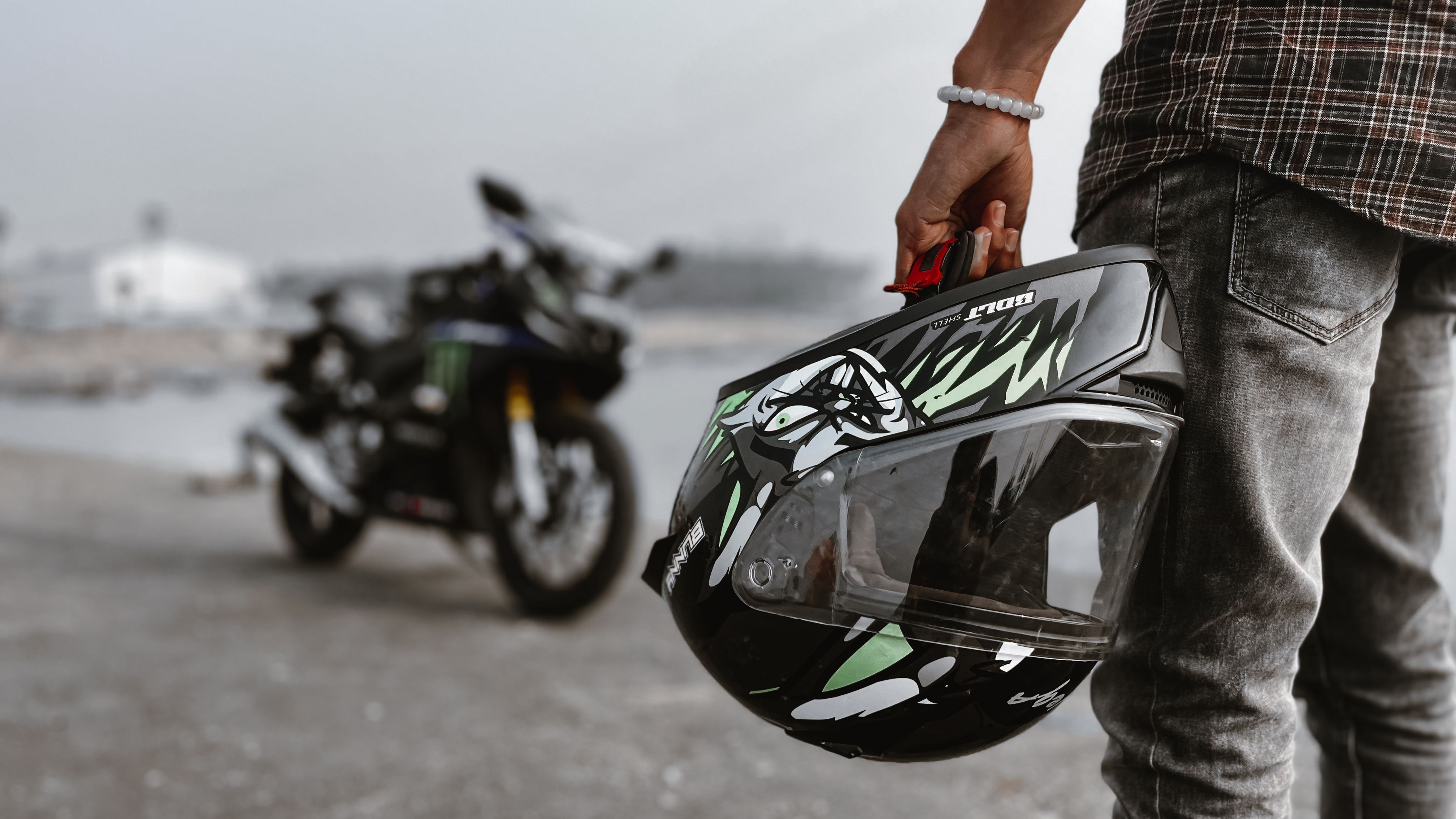 Person Holding a Helmet