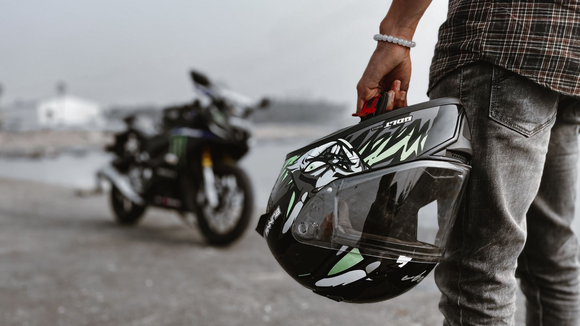 Person Holding a Helmet