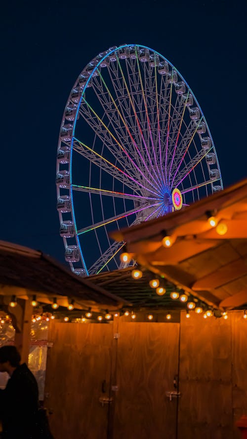 Illuminated Ferris Wheel at Night