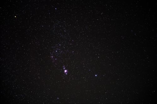 Free A stunning view of the Orion constellation in the starry night sky over Joshua Tree, CA. Stock Photo