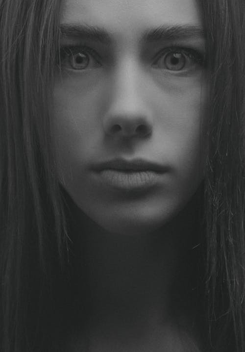 Black and White Photo of Woman's Face