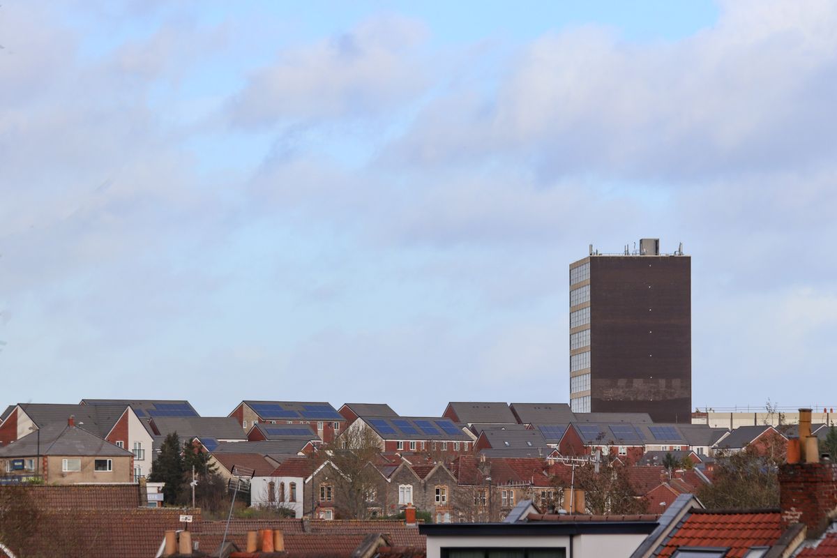 Rooftop solar panels across terraced houses in Bristol, showing how UK homes generate power to store in a home battery