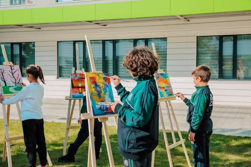 Children Painting on Lawn