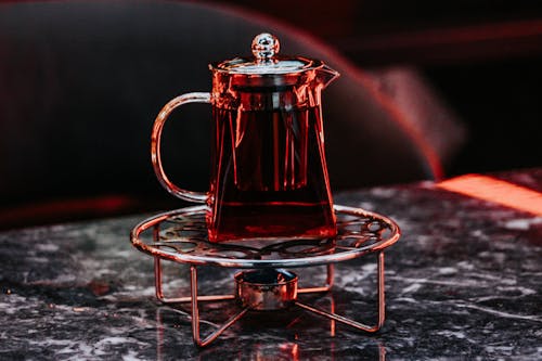 Free Pot of Tea on Cafe Table Stock Photo