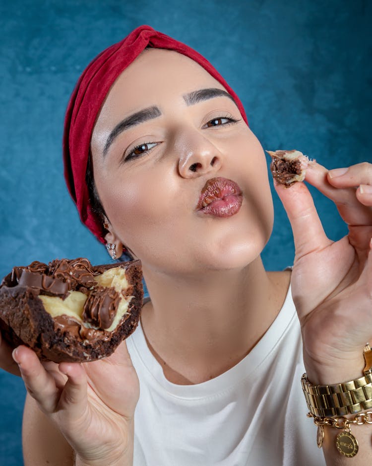 A Woman Eating Chocolate Cake