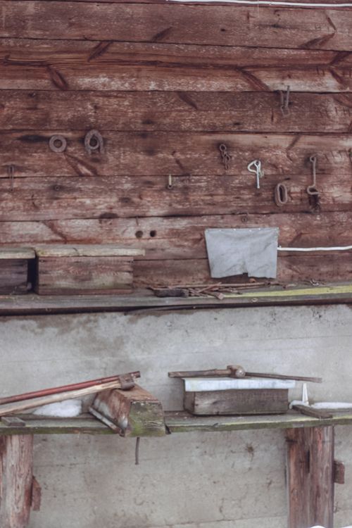 Free Aged barn wall with tools and shelves in a rustic Polish setting. Stock Photo
