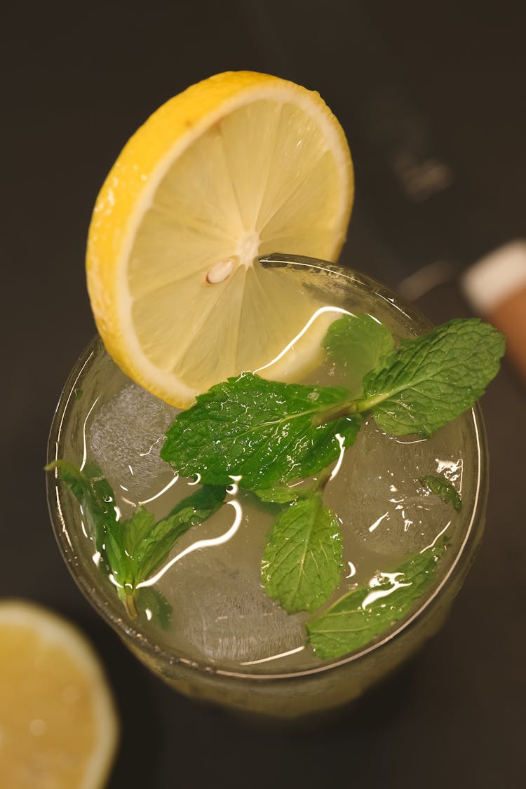 A Cocktail With A Lemon Slice Garnish