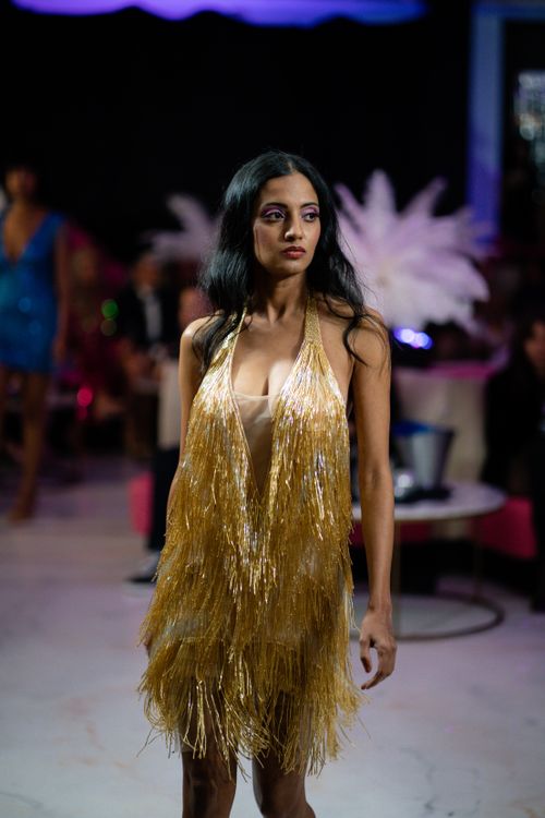 Model in a Golden Dress on a Fashion Show Free Stock Photo Model in a Golden Dress on a Fashion Show Free Stock Photo