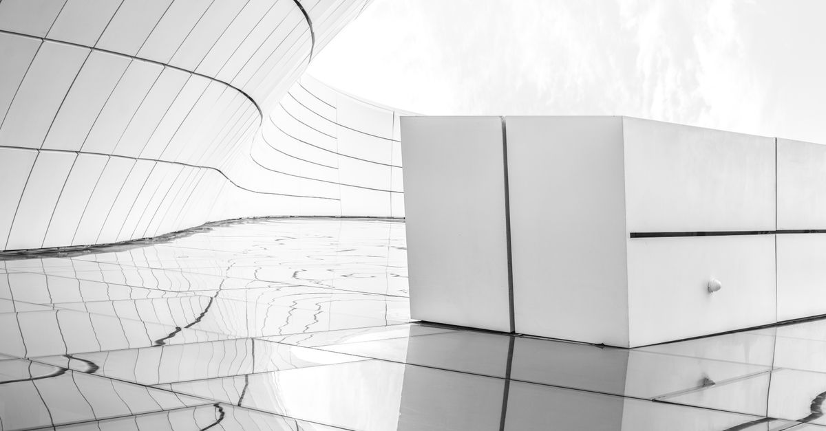 Futuristic Courtyard Lined with Shining White Tiles · Free Stock Photo