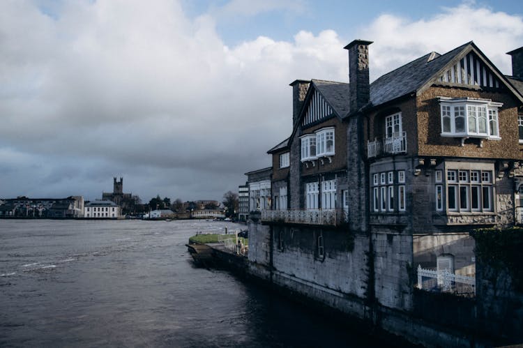 A Traditional House On The Shannon Riverbank In Limerick, Ireland 