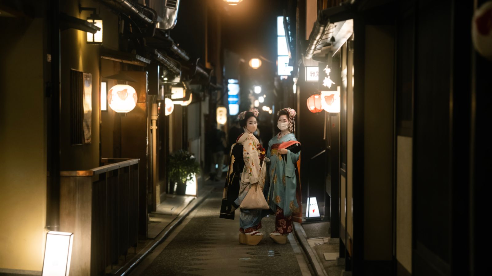 Gion after dark — lantern light on the old lanes of the geisha district.
