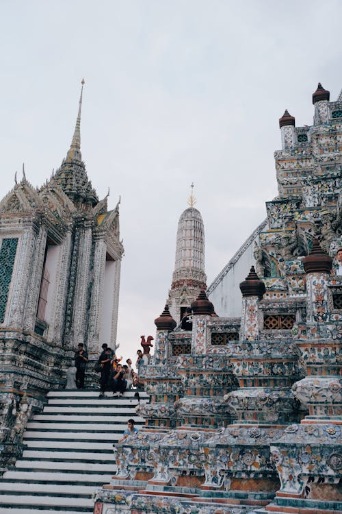 People Standing Near Wat Arun