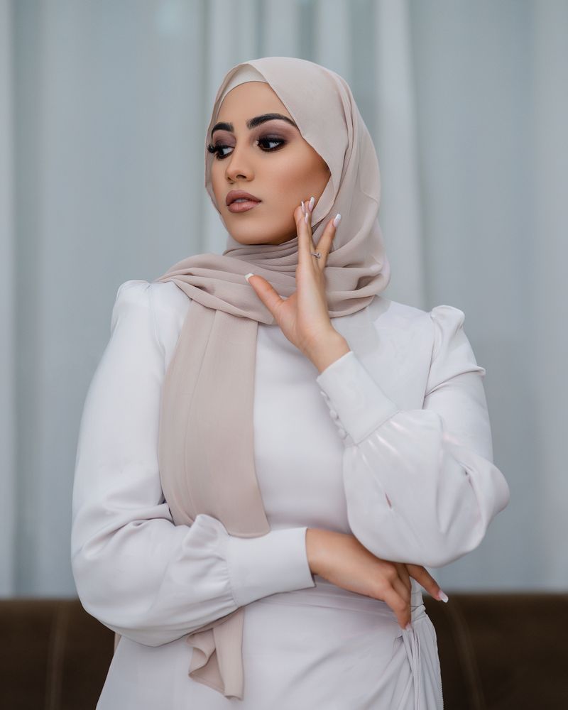 Satin midi skirt with a modest blouse