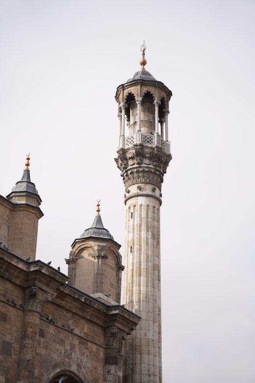 Free Vertical shot of the Aziziye Mosque minaret in Konya, Turkey, showcasing Islamic architecture. Stock Photo