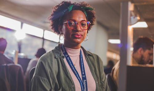 Portrait of Woman Wearing Red Rimmed Glasses