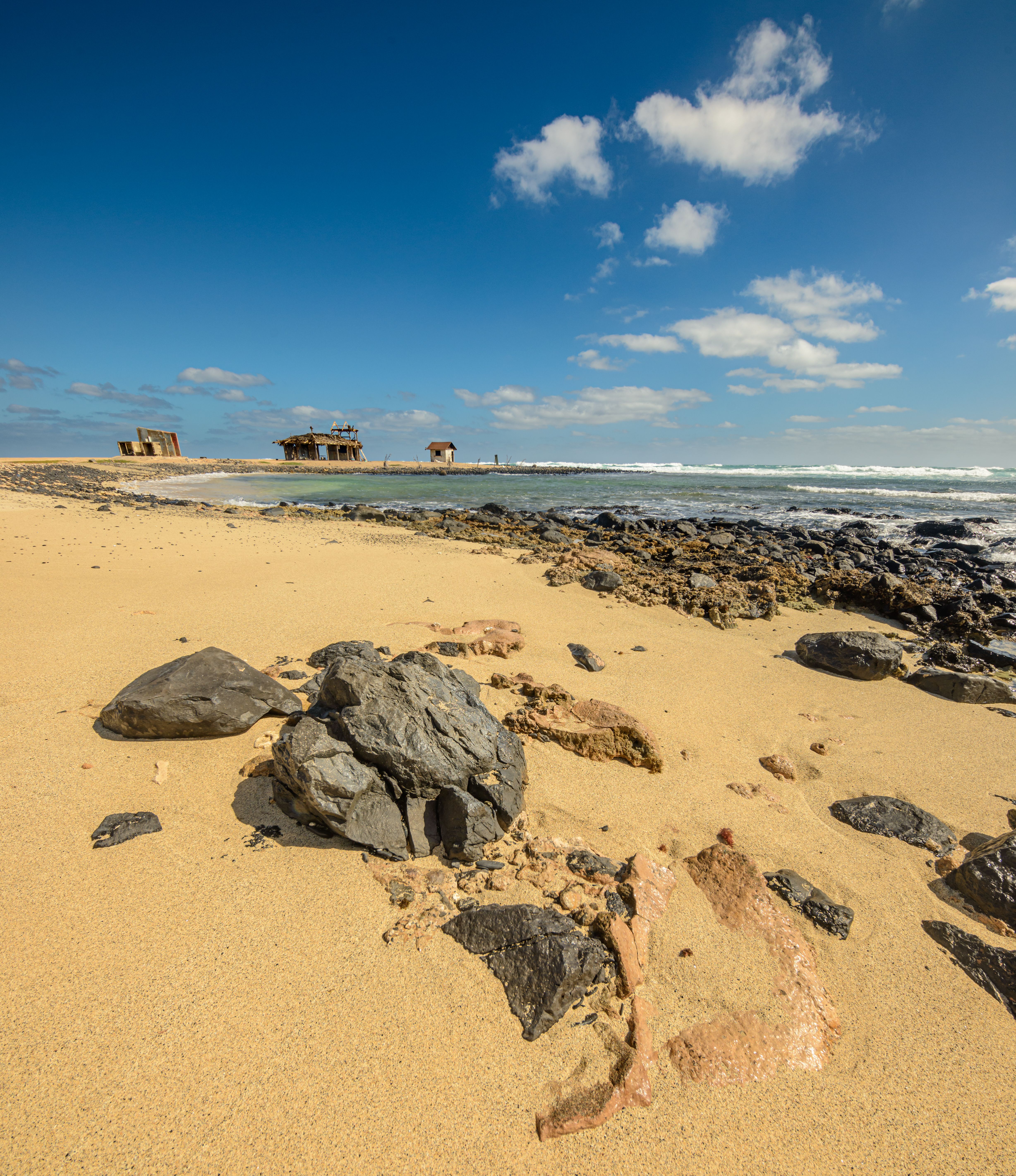 Rocks on a Sand Beach · Free Stock Photo