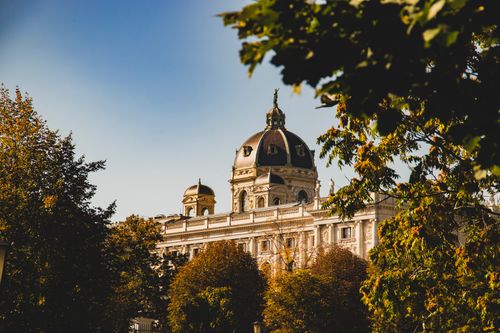 Free Stunning view of the Kunsthistorisches Museum surrounded by autumn foliage in Vienna, Austria. Stock Photo