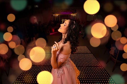 Woman in Pink Strapless Dress at Party