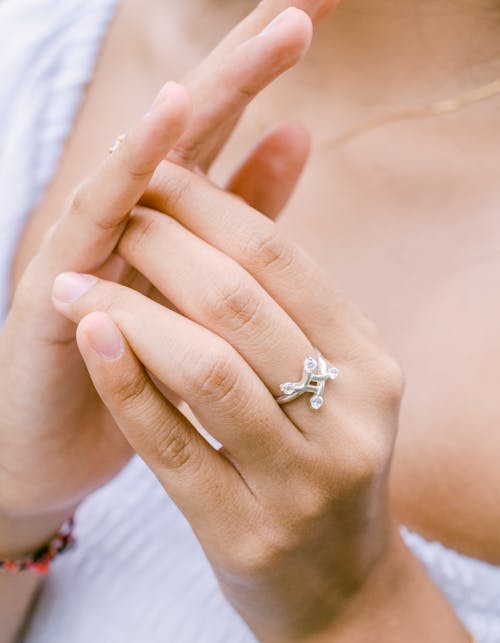 Free A Person Wearing Silver Ring Stock Photo